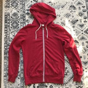 Red zip-up hoodie w/ white lining